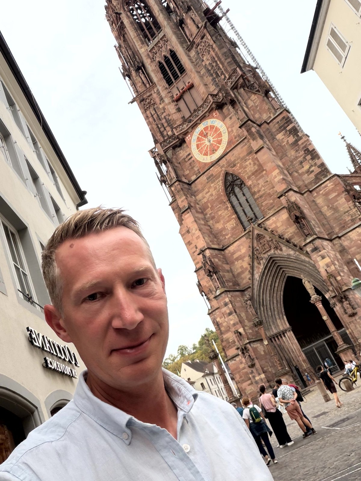 Personal photograph in front of Freiburg Minster.